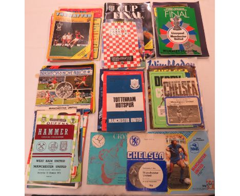 Approximately ninety Manchester United Football Club programmes from the 1970s to the 2000s for finals, away matches and test