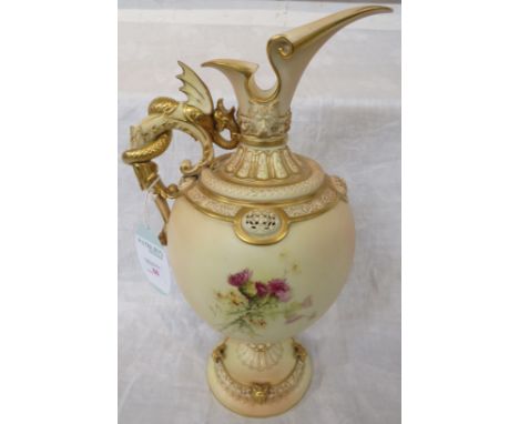 A large Royal Worcester blush ivory porcelain ewer, the body painted with thistles and flowers with moulded satyr mask heads 