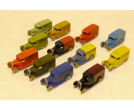 Reproduction Dinky Vans, A white metal group of vintage advertising vans including 'Meccano',  'Hornby Trains', 'Kodak', 'Oxo