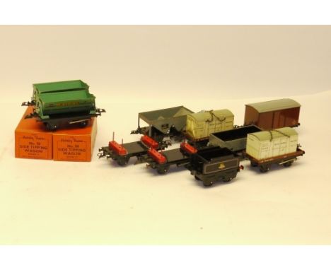 Hornby O Gauge No 50 Freight Stock and Tenders, comprising 6 boxed side-tipping wagons, goods van, two low-side wagons with c