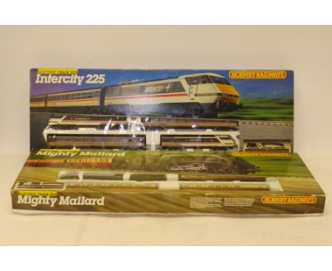 Two Hornby (Margate) Train Sets, comprising R542 'Mighty Mallard' set with BR green 'Mallard' and three red/cream coaches, an