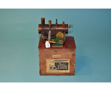 A 'Hobbies' Live Steam Spirit-fired SE4 Stationary Engine, a twin-cylinder engine with green frame on red base with Hobbies t