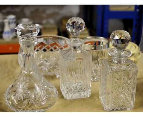 An Edinburgh crystal square glass Spirit Decanter, another, a ships decanter, ice bucket and cut glass fruit bowl. 