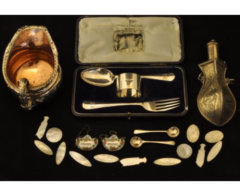 A silver Christening Set by Walker & Hall comprising spoon, fork and serviette ring (cased), two enamel Decanter Labels, a pa
