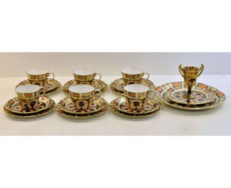 A Royal Crown Derby Imari pattern Teaset comprising six cups, six saucers, seven plates and a bread and butter plate, pattern