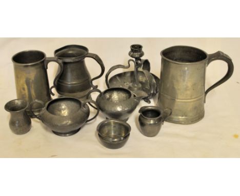 A Victorian pewter Quart Mug, another pewter Mug by James Dixon, a pewter Candlestick, and other items. 