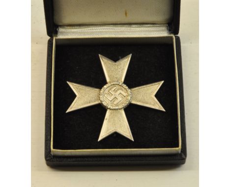 A World War II German Nazi War Merit Cross First Class, in box of issue. 