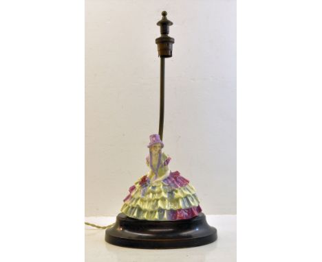 A Royal Doulton Figure "Chloe" HN1470, withdrawn by 1949, mounted as a table lamp on an oval wooden base. 