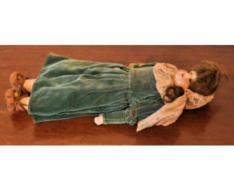 A small Armand Marseille bisque head Doll with sleeping eyes and open mouth, 13" (33cms) high. 
