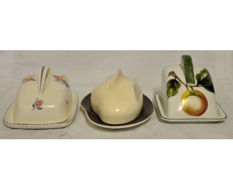 A Poole pottery Cheese Dish and cover decorated with stylised flowers, a Radfords cheese dish and cover painted with fruit an