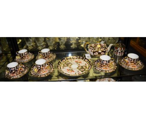 A Royal Crown Derby Imari pattern teaset, comprising of teapot, biscuit plate, six side plates, six saucers and six cups, no.