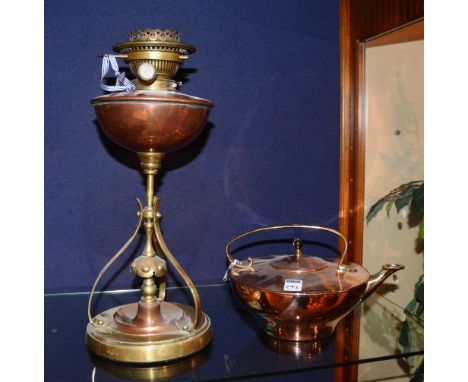 An Arts & Crafts brass and copper oil lamp by Hinks Duplex No.2, in the manner of William Arthur Smith Benson, with copper re