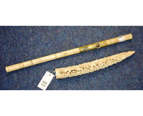 A carved ivory tusk, decorated with birds in foliage, 32cm long, including a carved bone five section opium pipe, (2)  