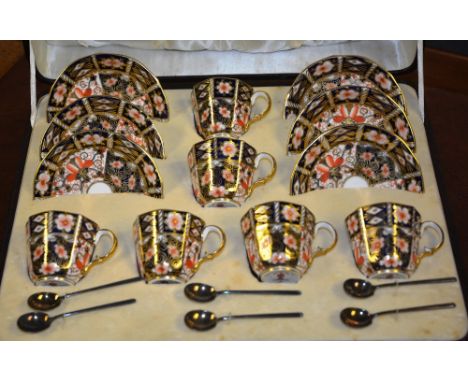 A Royal Crown Derby Imari pattern coffee set in case, comprising of six cups and six saucers with six silver coffee spoons CO