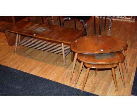 An Ercol nest of three tables, 39cm high, together with a similar Ercol coffee table, 36cm high x 164cm wide (2)