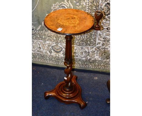 A Victorian walnut inlaid wine table, the circular top with revolving smokers attachment, above reeded and spiral twist colum