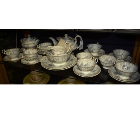 An early 20th century Rockingham Moss Fibre teaset, comprising of two biscuit plates, cream and sugar bowl, sucrier, teapot, 