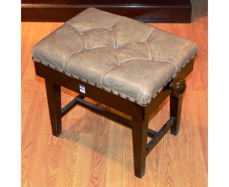 An adjustable piano stool, with leather buttonback top, raised on plain tapering supports, 44cm high x 53cm wide