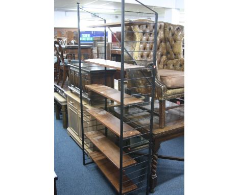 A METAL FRAMED ADJUSTABLE SHELF UNIT, with six shelves