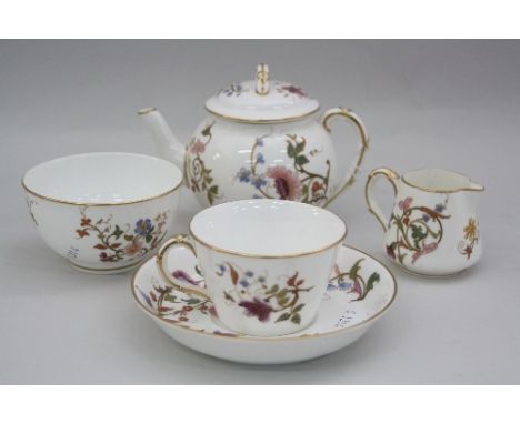 A ROYAL WORCESTER BACHELORS TEA SERVICE, decorated in coloured enamels with floral decoration and gilt highlights, puce marks