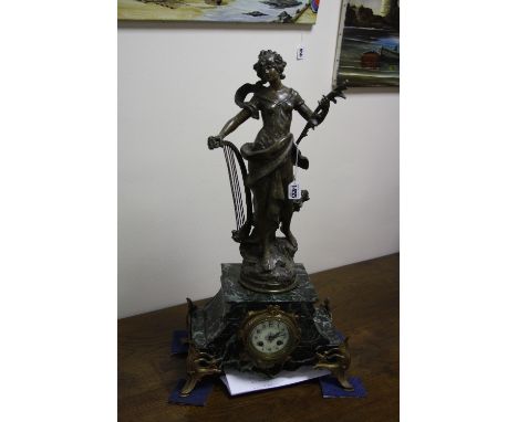 A FIGURAL MANTEL CLOCK, with spelter maiden with harp with plaque, 'La Melodie par Aug Moreau' on stepped marble base with or