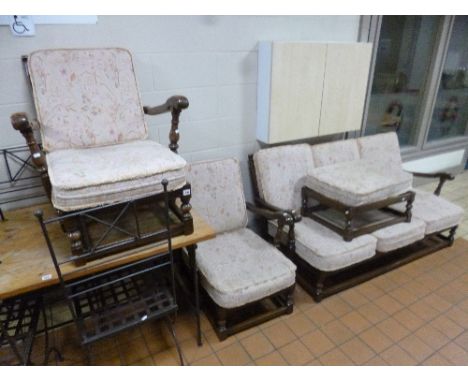AN ERCOL FOUR PIECE LOUNGE SUITE, on wooden frame with removeable upholstered cushions