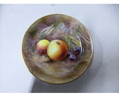 A ROYAL WORCESTER TRINKET DISH, Fallen Fruits design by D. Bowket, black factory mark, diameter 11cm