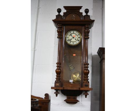 A VICTORIAN WALNUT CASED VIENNA STYLE WALL CLOCK, (sd) (pendulum)