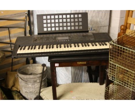 A YAMAHA ELECTRONIC KEYBOARD, with stand and stool