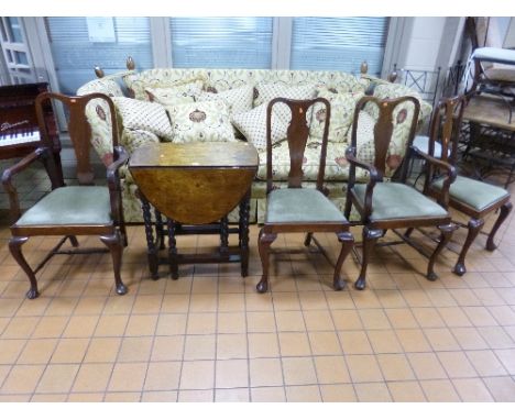 A SMALL OAK BARLEY TWIST GATE LEG TABLE, and four mahogany chairs including two carvers (5)