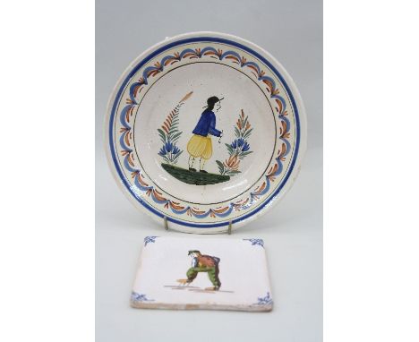 A DELFT PLATE, depicting traditionally dressed gent with pipe, approximately 22.5cm diameter, monogrammed HB for Hugo Brouwer
