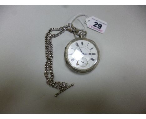 A SILVER POCKET WATCH, with white enamel dial and Roman numerals, together with a curb link Albert chain, dial sd, hallmarks 