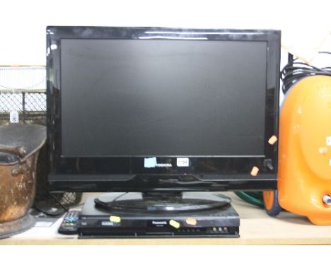 A TOSHIBA 26' LCD TV, a Panasonic DVD recorder (remote to dvd)