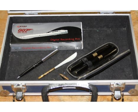 A METAL CASE, to include two Pilot Super 150L FNOS/FN22 advertising pens with 14K gold nibs (cased) and a boxed 007 Digital R