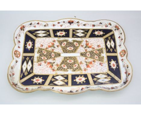 AN IMARI DESIGN CERAMIC TRAY, length approximately 44.5cm (restorations)