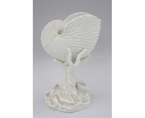 A ROYAL WORCESTER NAUTILUS VASE, with coral support and shell mounted base, green marks c.1963, shape 101, approximately 17cm