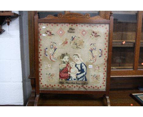 A 19TH CENTURY SAMPLER FIRESCREEN, 'Joseph, Mary and Jesus 1847' by Mary Buckley (sd)
