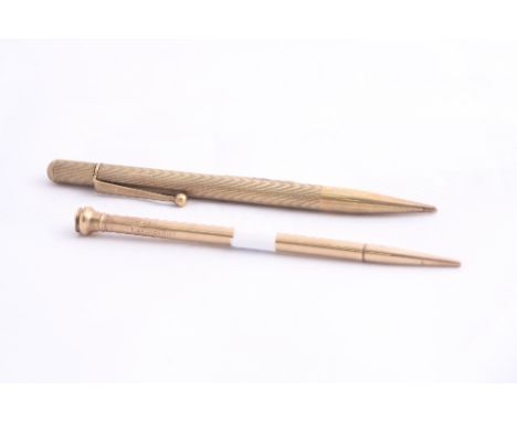 TWO 9CT GOLD PROPELLING PENCILS, both stamped .375, one is an Evespoint Notebook pen, the other is engine turned detailed
