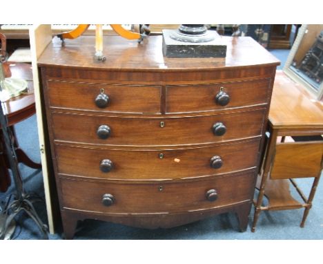 A GEORGIAN MAHOGANY BOW FRONT CHEST, of two short and three long drawers on bracket feet supports (in two sections), approxim