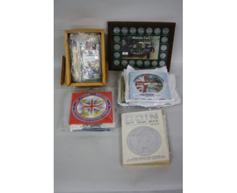 TWO BOXES OF COINS, YEAR SETS AND COMMEMORATIVES, to include sixteen U K uncirculated coin collections from 1994 to 2000, car