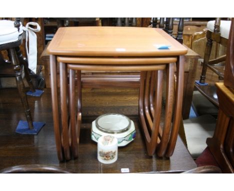 A PARKER KNOLL TEAK NEST OF THREE TABLES, Sandland Ware lidded pot and a ceramic bowl (3)