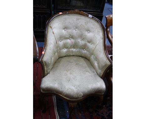 A 19TH CENTURY WALNUT INLAID SERPENTINE FRONT ARMCHAIR, with central front leg, silk floral upholstery and button back (sd)