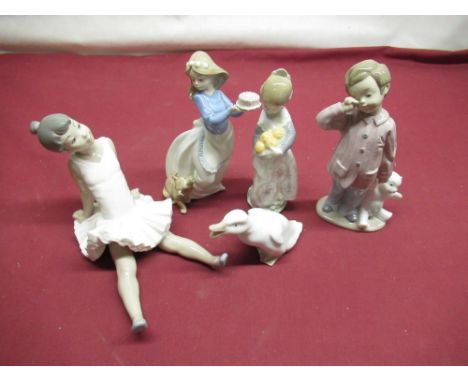 Selection of Lladro and Nao figurines including 4841 Valencian girl, Puppy's Birthday etc (5) 