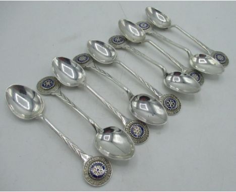Set of nine mid C20th hallmarked silver and enamel teaspoons for the No. 3 District Rotary in Great Britian in Ireland (RIBI)