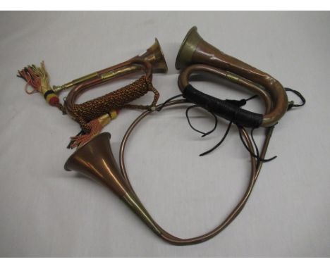 Brass and copper bugle, stamped J. W. York &amp; Sons, Michigan, 1915, L27cm, another smaller bugle, brass French horn (3) 