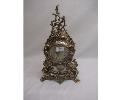 C20th reproduction mantel clock, heavily gilt in an ornate French rococo design, H42cm 