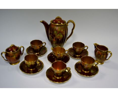 A Carlton Ware Rouge Royale coffee service, for six, comprising coffee pot, sugar bowl and cover, milk jug, coffee cups and s