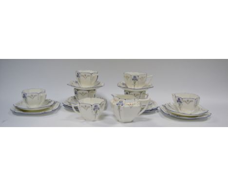 A Shelley Queen Anne Iris pattern  tea service,  for six, printed with stylised flowers, comprising seven teacups, six saucer