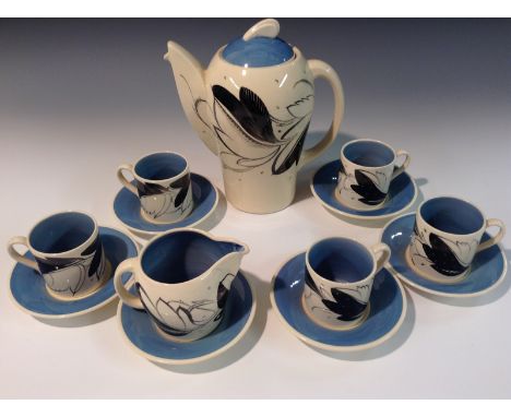 A Susie Cooper Kestral shape coffee service, comprising coffee pot and cover,  five coffee cans and six saucers, each boldly 