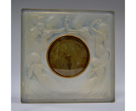 A Rene Lalique Naiades opalescent glass mantel clock, in relief with sirens with free flowing hair, in swathes of waves and b